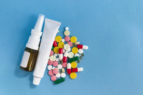 Various medicines on a blue background