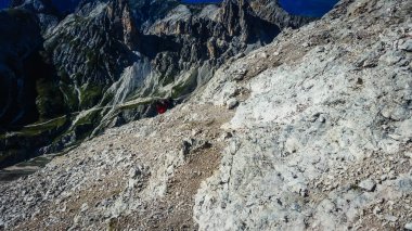 Mount Catinaccio d'Antermoia. Mountains in the Dolomites. Climbing on via ferratas. Mountain panorama in Italy. Snow in the mountains. Rocky mountains in the Dolomites.