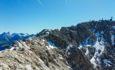 Mount Catinaccio d'Antermoia. Mountains in the Dolomites. Snow in the rocky mountains. Via ferrata in the Dolomites. Mountain trips.