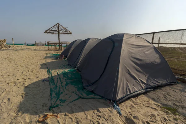 Tourists dome tent on Mandarmani sea beach morning time to enjoy nature.