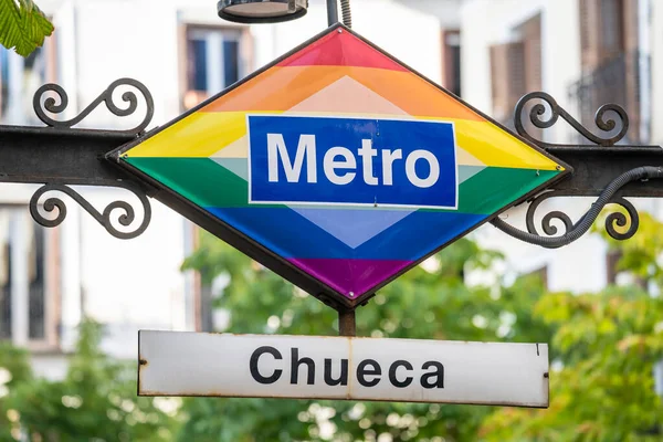 Chueca metro stop, in the city of Madrid, serigraphed with the multicolored gay pride flag