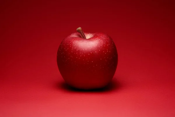 Organic Red Apple Bright Red Background — Stock Photo, Image