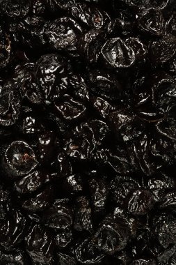 A set of dried fruits for proper healthy nutrition close-up top view background