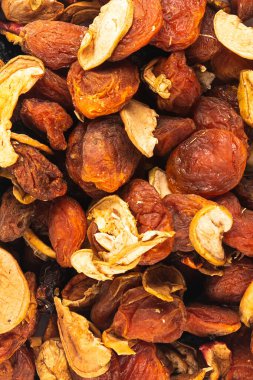 A set of dried fruits for proper healthy nutrition close-up top view background