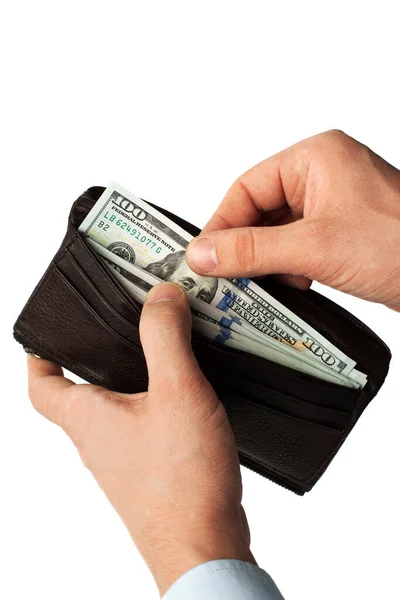 Med kontanter från en plånbok - lager bild Stockfoto