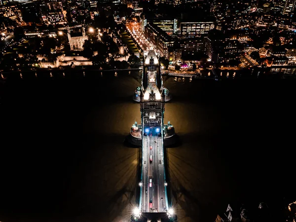 Air drone view of London Tower Bridge at night City center and the River Thames, England, United Kingdom — стоковое фото