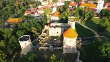 Aerial view of beautiful ruins of ancient Livonian castle in old town of Cesis, Latvia. Located within Gauja national park