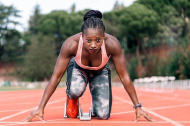 Koşucu başlangıç konumunda