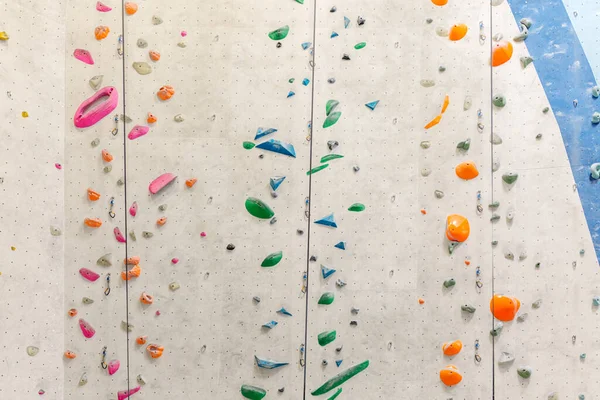 Colorful High rock climbing wall. — Fotografia de Stock