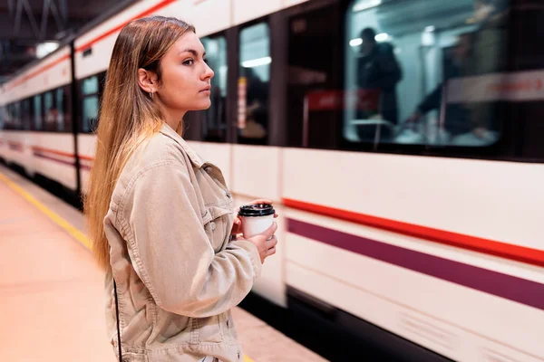 Blonde Girl Waiting for her Train — 스톡 사진