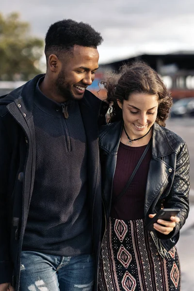 Happy Young Couple Using Phone — 스톡 사진