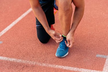 Closeup Young Athlete Tying Laces