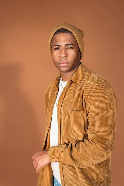 Young Man Wearing Hat Posing Studio Shot Brown Background — Stock Photo, Image