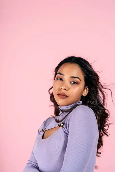 Stock Photo Expressive Girl Looking Camera Light Pink Background Studio — Stockfoto