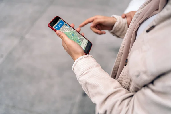 Stock Photo Unrecognized Woman Looking Map Her Phone — Foto de Stock