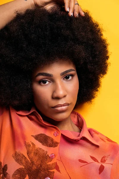 Confident Afro Woman Posing Studio Shot Looking Camera Yellow Background — Stockfoto