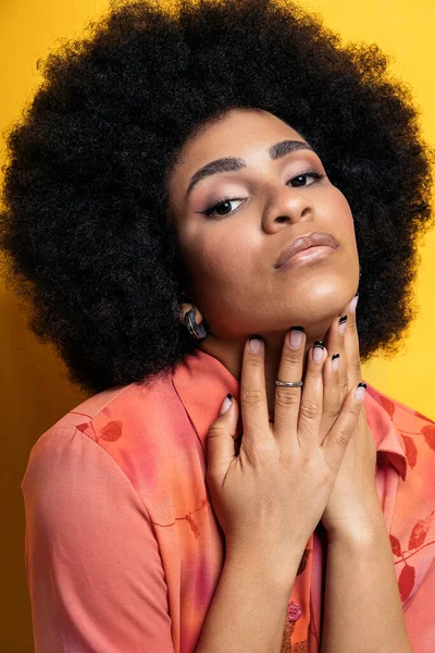 Confident Afro Woman Posing Studio Shot Looking Camera Yellow Background — Stockfoto