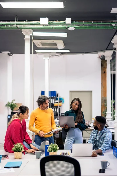 Diverse Teamwork Talking Using Laptops Modern Bright Office Working Concept — Stock fotografie