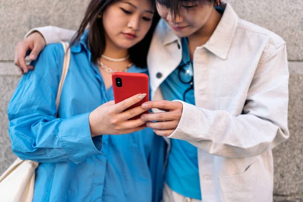 Young Asian Couple Standing Street Looking Mobile Phone — Stock Photo, Image