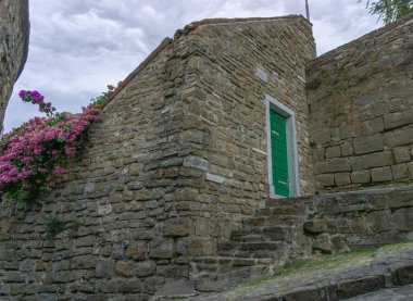 Piran, Slovenia - August 23, 2021: Typical architecture in the medieval town Piran on the hill