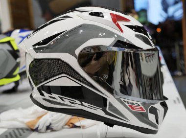 Elmets exposed at EICMA, international motorcycle exhibition, Lombardy, Italy.