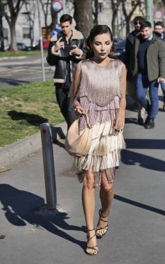 Fashion blogger Karina posing for photographers before Fendi fashion show during Milano fashion week woman fall/winter collections