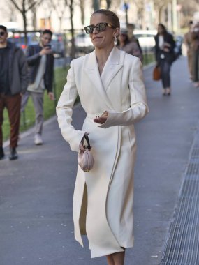 Fashion blogger Caroline Daur walking in the street before Fendi fashion show during Milano fashion week woman fall/winter collections