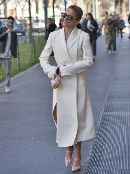 Fashion blogger Caroline Daur walking in the street before Fendi fashion show during Milano fashion week woman fall/winter collections