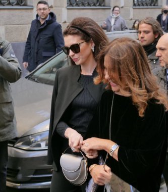 Anne Hathaway and Roberta Armani walking in the street before Armani fashion show during Milano fashion week fall/winter woman collections 2022