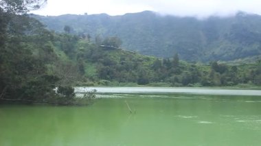 Harika Warna Gölü Turizmi Dieng, Wonosobo Regency, Central Java, Endonezya 'da güzel ve romantik doğal panoramayla.