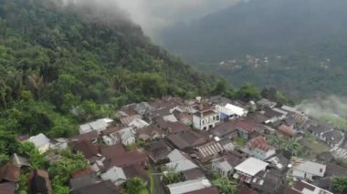beautiful village scenery in the mountains in Indonesia. Church & mosque side by side represents tolerance.