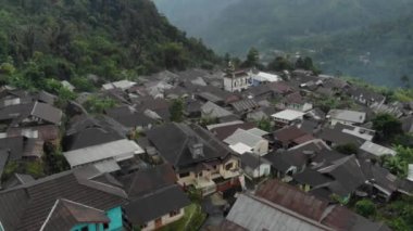 beautiful village scenery in the mountains in Indonesia. Church & mosque side by side represents tolerance.