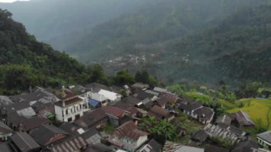 beautiful village scenery in the mountains in Indonesia. Church & mosque side by side represents tolerance.