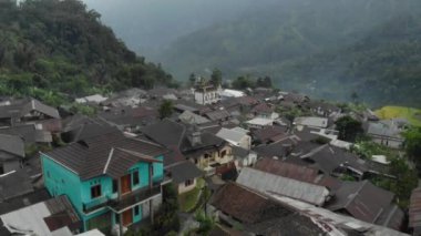 beautiful village scenery in the mountains in Indonesia. Church & mosque side by side represents tolerance.