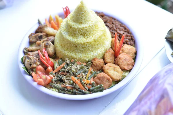 Variety Delicious Indonesian Tumpeng Side Dishes Tumpeng Rice Usually Used — стоковое фото