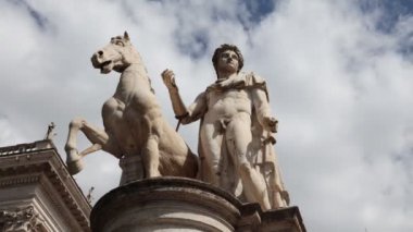 Time lapse of a statue at the entrance to Piazza del Campidoglio in Rome, Italy.