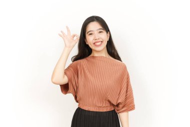 Beyaz arka planda tecrit edilmiş Güzel Asyalı Kadın 'ın Tamam İşareti