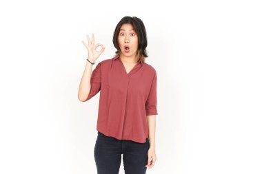 Beyaz arka planda tecrit edilmiş Güzel Asyalı Kadın 'ın Tamam İşareti