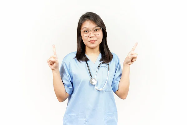 Showing Product Pointing Asian Young Doctor Isolated White Background — Stock Photo, Image