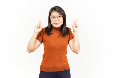 Beyaz Arkaplanda İzole Edilmiş Güzel Asyalı Kadın 'ın Şans Parmağı Hareketi