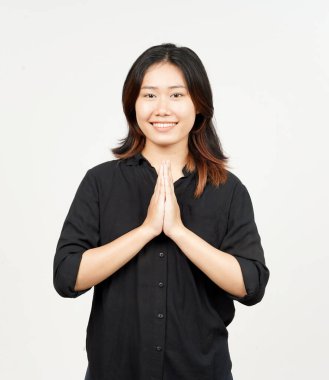 Beyaz arka planda tecrit edilmiş güzel Asyalı kadını selamlıyorum.