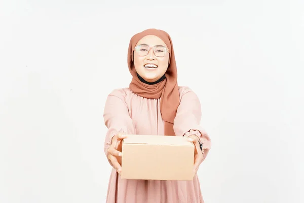 Holding Package Box or Cardboard Box of Beautiful Asian Woman Wearing Hijab Isolated On White