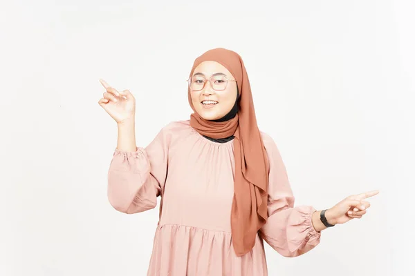 Pointing left right and showing two Product with forefinger of Beautiful Asian Woman Wearing Hijab