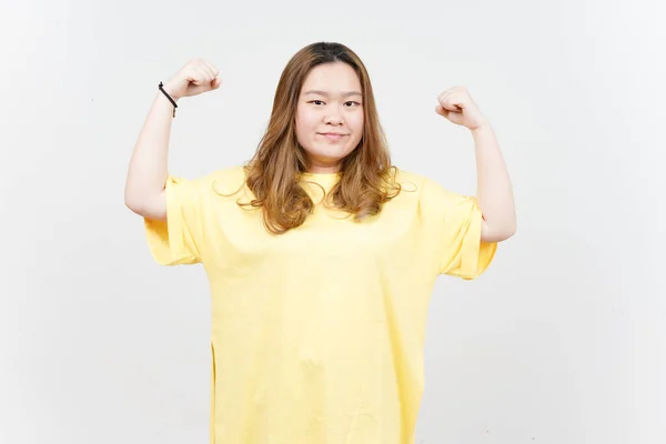 Showing Strength Arms Beautiful Asian Woman Wearing Yellow Shirt Isolated — Photo
