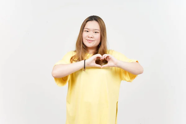 Showing Love Sign Beautiful Asian Woman Wearing Yellow Shirt Isolated — Fotografia de Stock