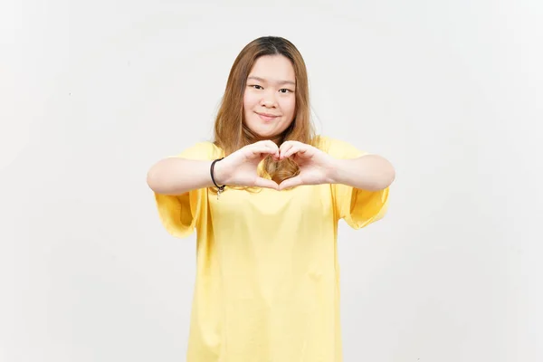 Showing Love Sign Beautiful Asian Woman Wearing Yellow Shirt Isolated — Fotografia de Stock