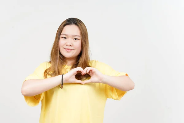Showing Love Sign Beautiful Asian Woman Wearing Yellow Shirt Isolated — Stock Photo, Image