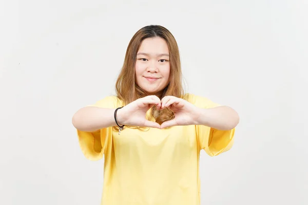 Showing Love Sign Beautiful Asian Woman Wearing Yellow Shirt Isolated — Fotografia de Stock