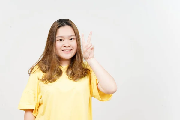 Showing Peace Sign Beautiful Asian Woman Wearing Yellow Shirt Isolated — Foto Stock