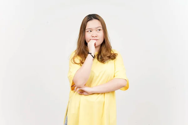 Thinking Gesture Beautiful Asian Woman Wearing Yellow Shirt Isolated White — Stockfoto